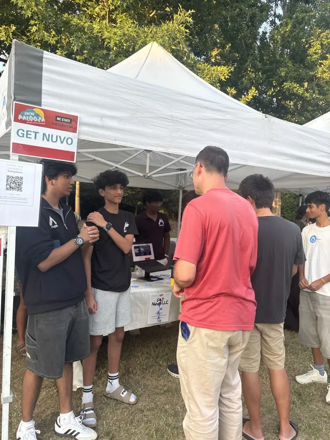 Students gathered at the Nuvo booth during NC State Entrepalooza